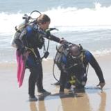 Beach rescue with scuba gear on